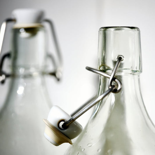 KORKEN Bottle with stopper, clear glass, 0.5L